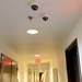 Multiple security cameras are seen on the ceiling in a hallway at Landmark.  Melanie Maxwell I AnnArbor.com